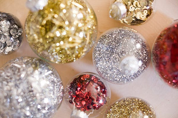 captivating-diy-festive-christmas-ornaments-transparent-glass-balls-with-glittery-sprinkles-colorful-bedazzle